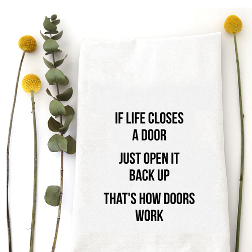 Wildwood Landing If Life Closes A Door Tea Towel